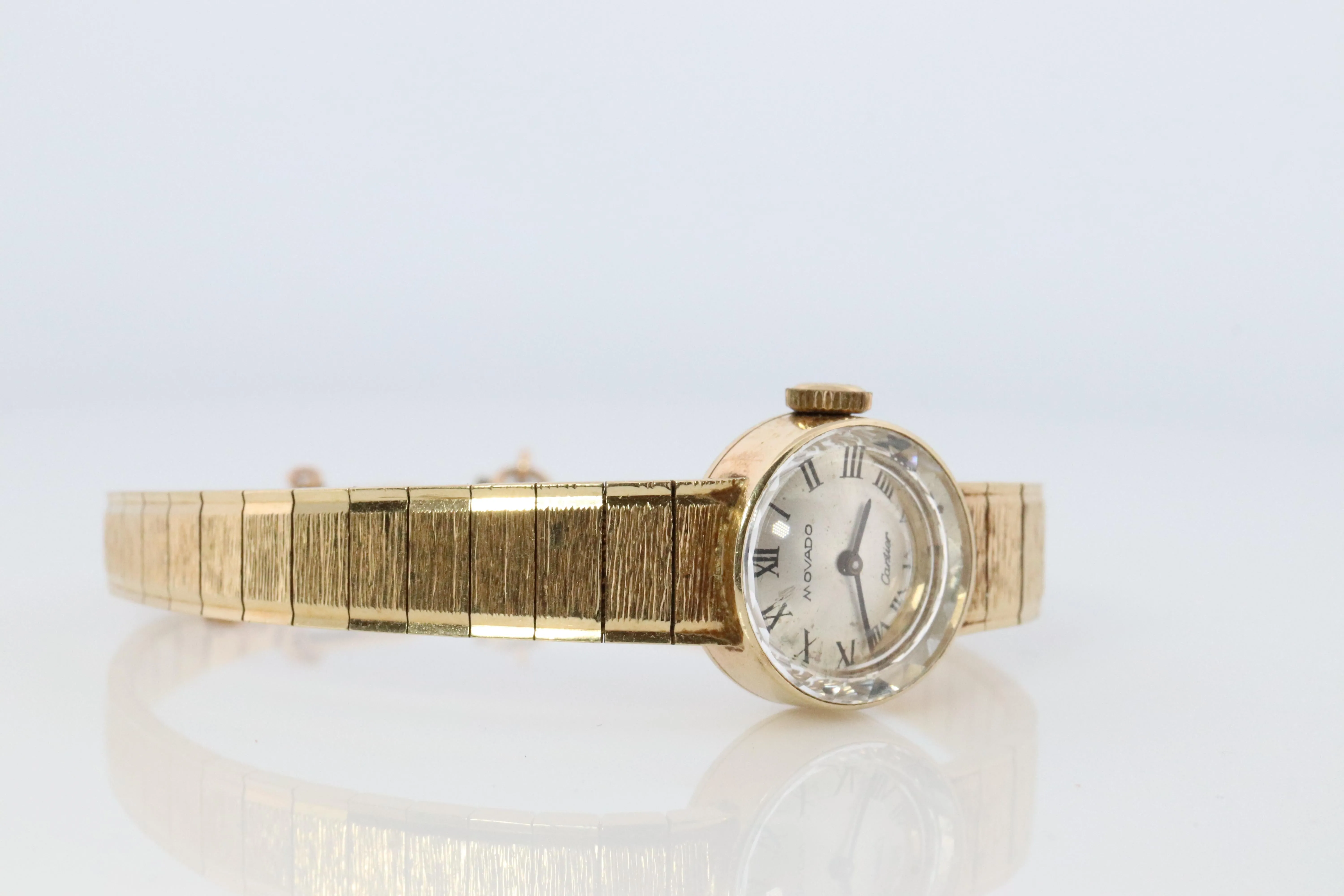 14k CARTIER x MOVADO mechanical watch. 14k YG Genuine Cartier Ladies Watch.